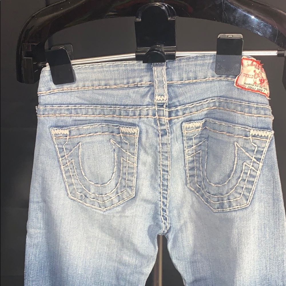 Woman’s True Religion blue jeans